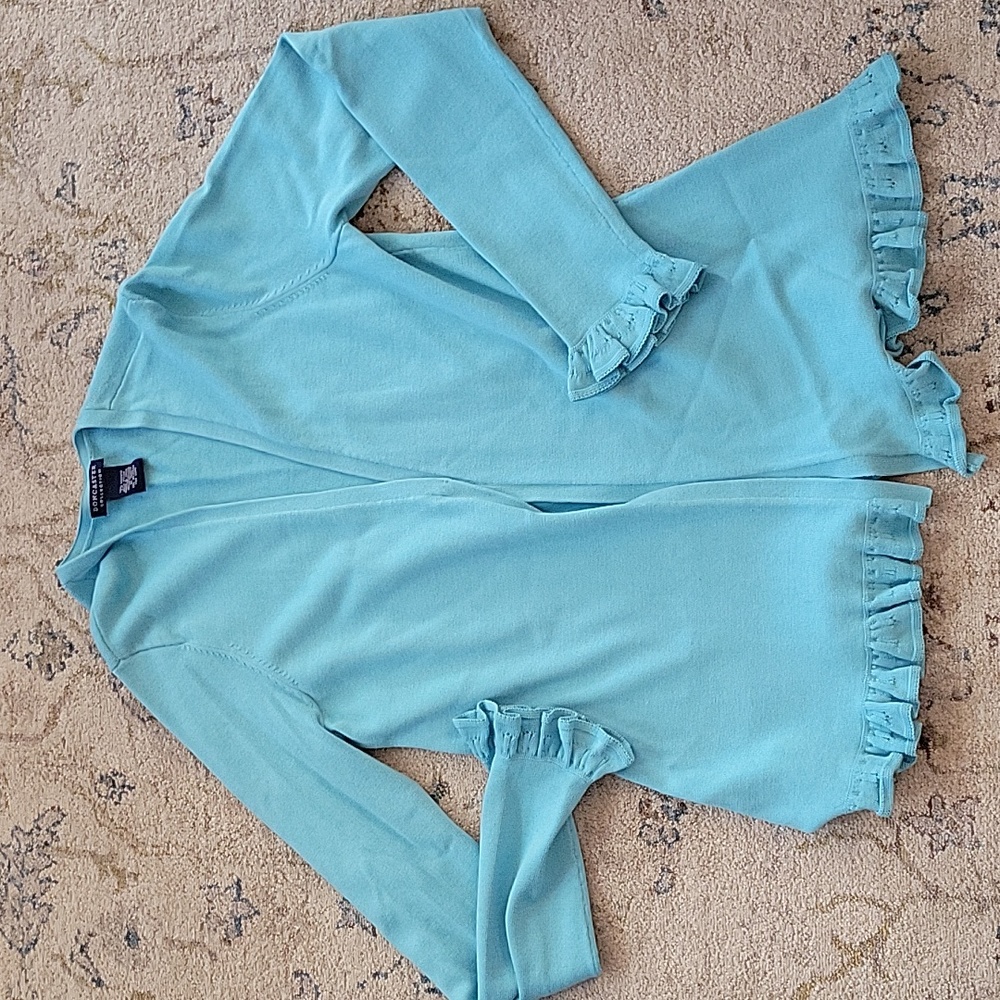 Doncaster spring light sweater blue with ruffles